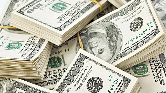 Dollar Index Dips Near 100 as Risk Sentiment Improves